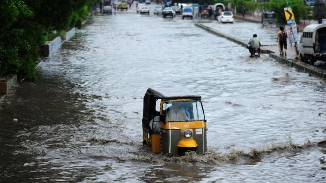 Auto Rickshaw in Flood Water