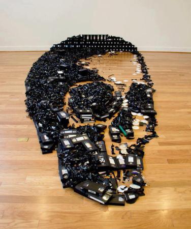 497 Video Casettes and a skull