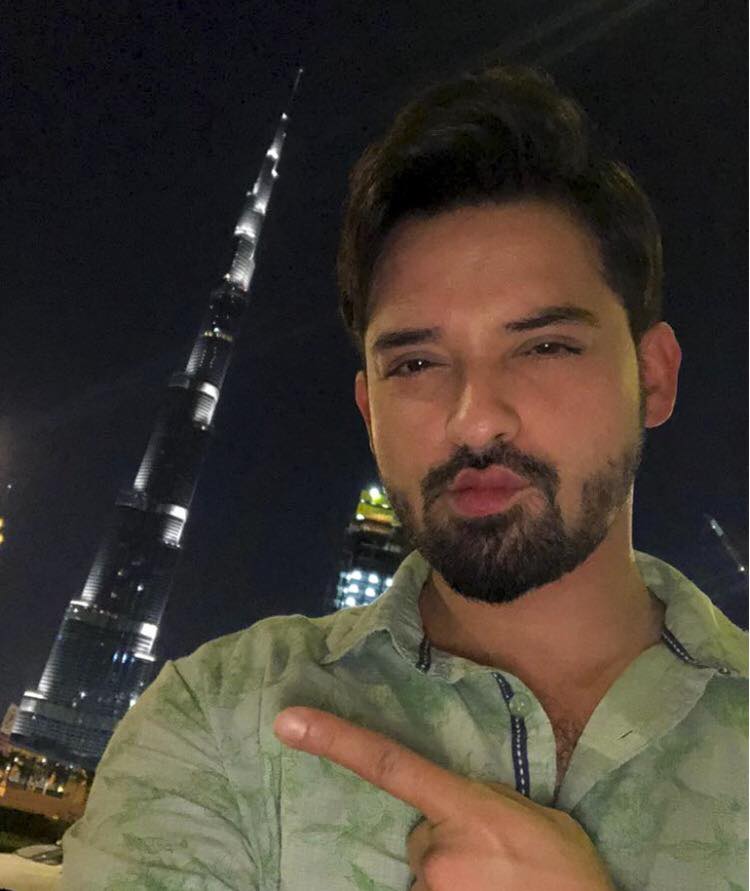 Noman Habib Posing In Front Of The Burj Khalifa