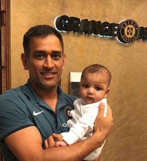 MS Dhoni Holding Sarfraz Ahmed's Son