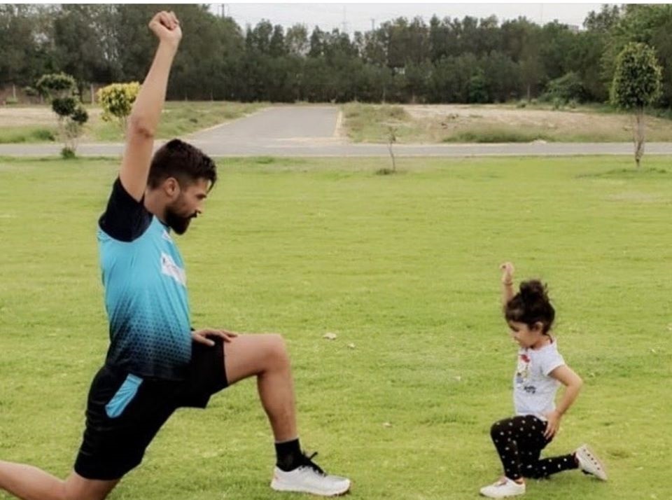 Muhammad Amir Doing Exercise With His Daughter