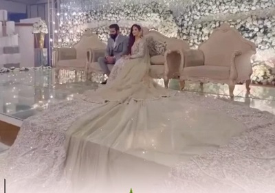 Pakistani Bride Wearing Astounding Long Lehenga