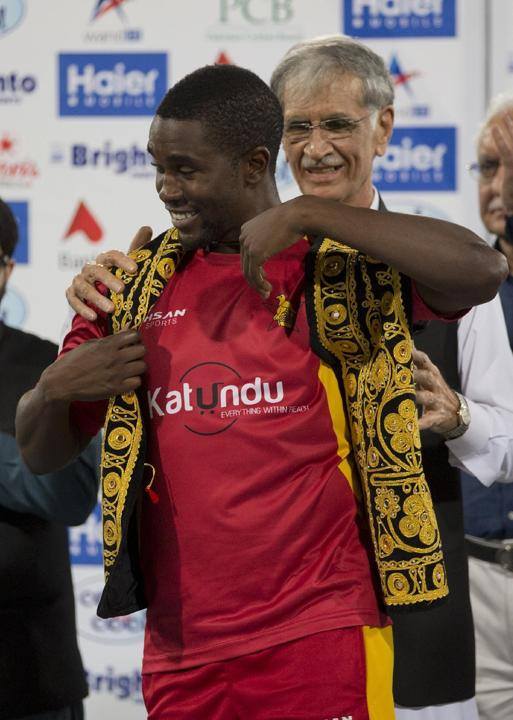 Pervez Khattak Gifting KPK Traditional Jacket To Elton Chigumbura