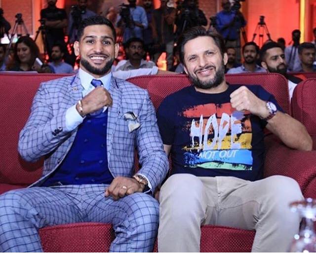 Shahid Afridi Poses With Amir Khan At The Opening Of His Boxing Academy