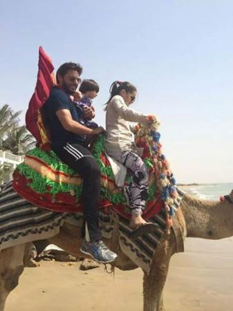 Shahid Afridi Riding Camel With Daughters