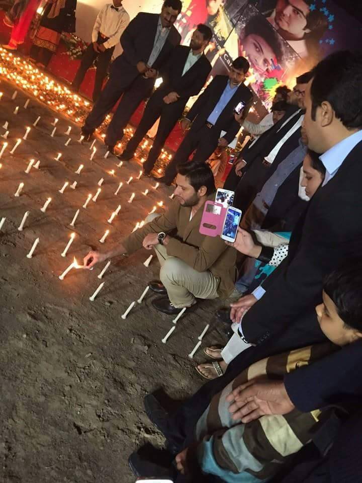 Shahid Afridi‬ & team lighting candles at the vigil
