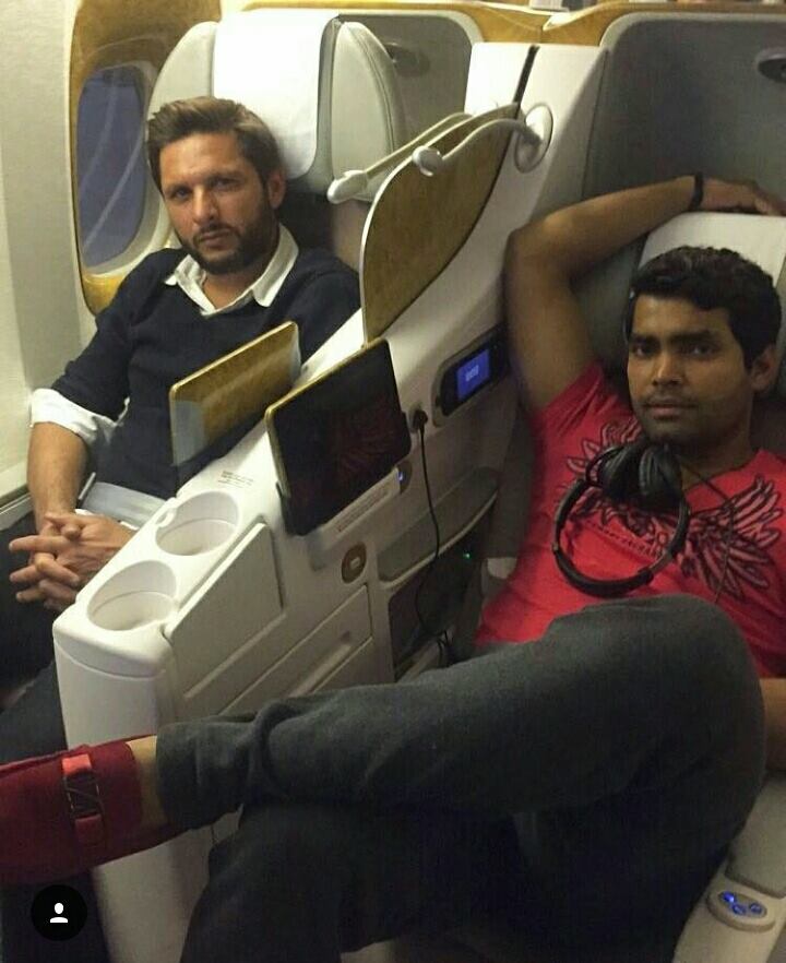 Shahid Afridi nd Umar Akmal on A flight from ‪‎Dubai‬