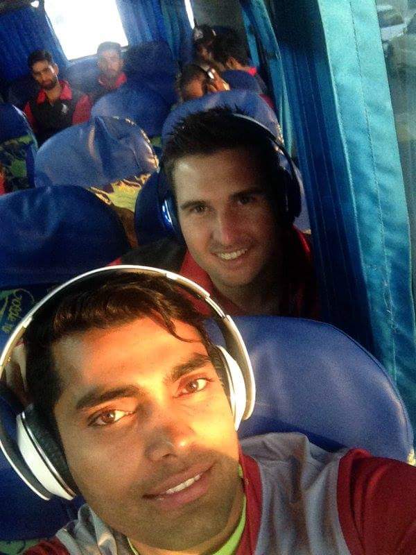 Umar Akmal with Delport