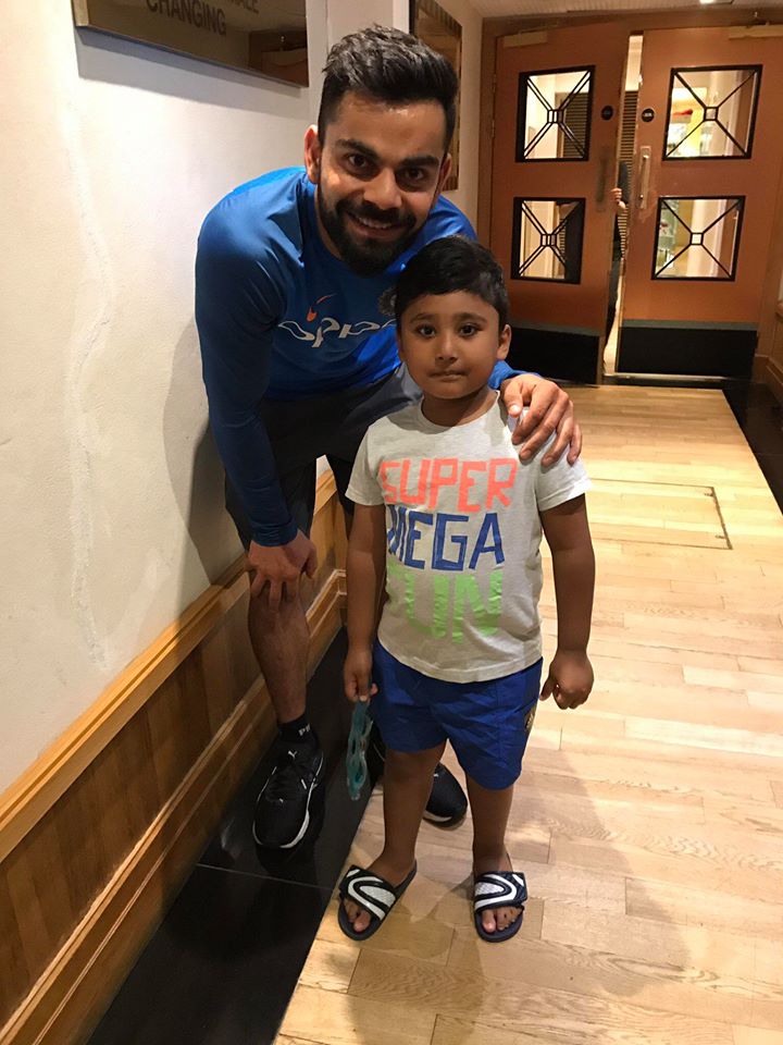 Virat Kohli with Azhar Ali Kid