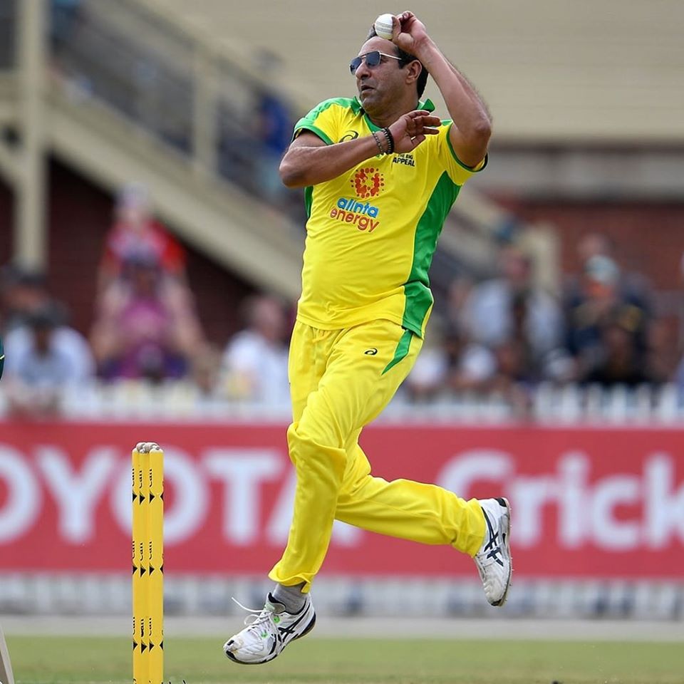 Wasim Akram In Action During Bushfire Cricket Match At Australia