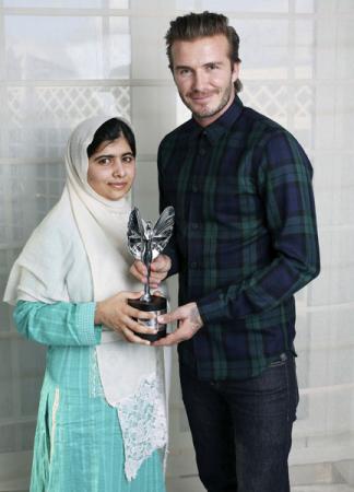 Honour: David Beckham with courageous Malala Yousafzai