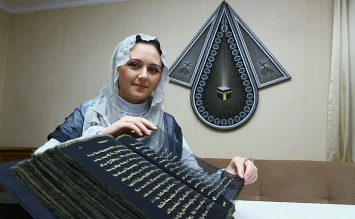 Artist From Azerbaijan Spends Three Years Writing Quran With Gold On Silk