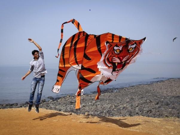 Tiger-shaped kite during the International Kite Festival in Mumbai, India