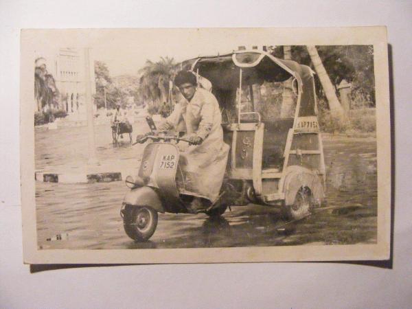 An old pic of Rickshaw Driver with his rickshaw at Karachi in 1960