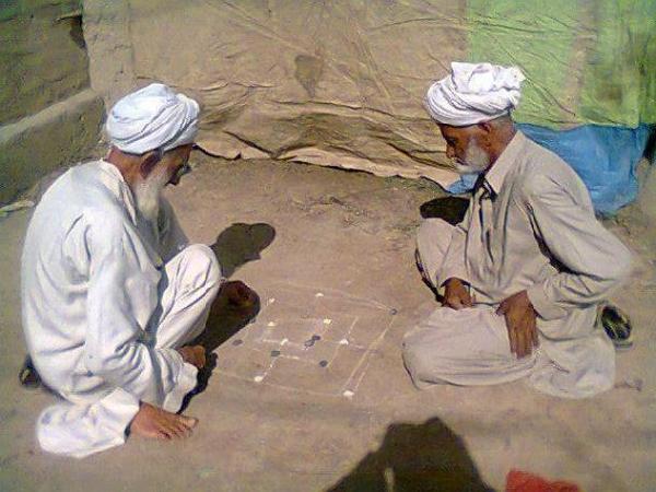Old people playing game in a Village of Pakistan